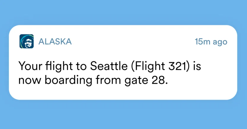 A real-time push notification from Alaska Airlines that updates the passenger about the flight's gate number