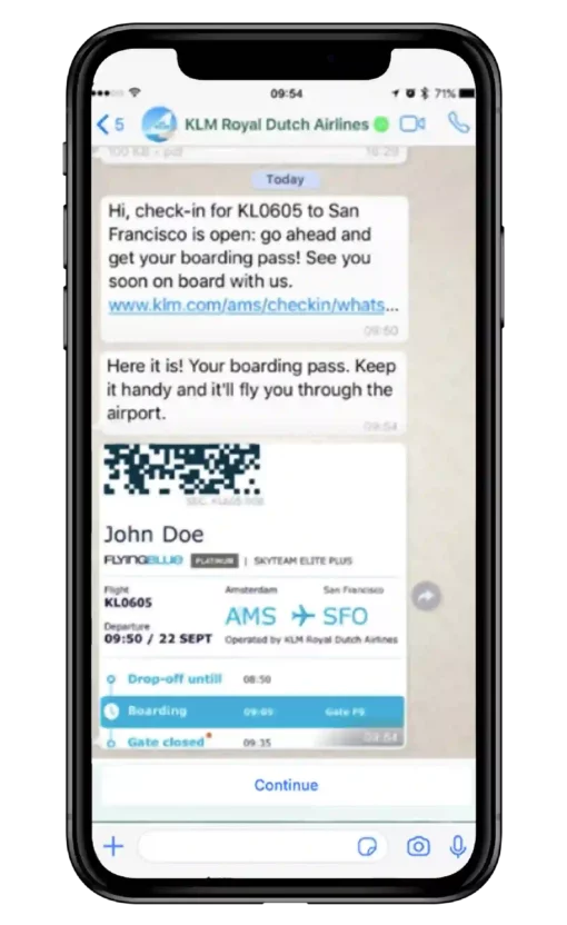 A mobile phone displaying a WhatsApp message with flight details from KLM airlines