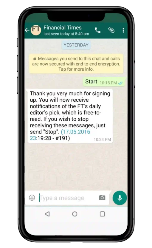 A mobile phone displaying a WhatsApp advertising message from the Financial Times