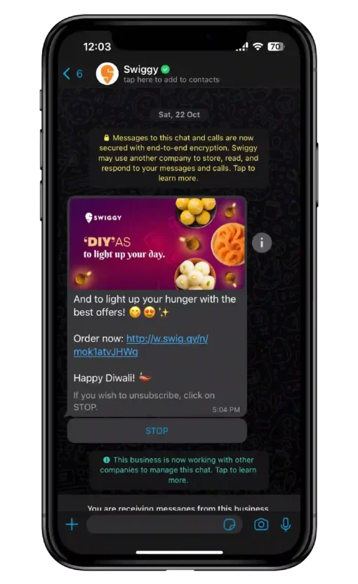 A mobile phone displaying a WhatsApp message from Swiggy recommending a promotional offer